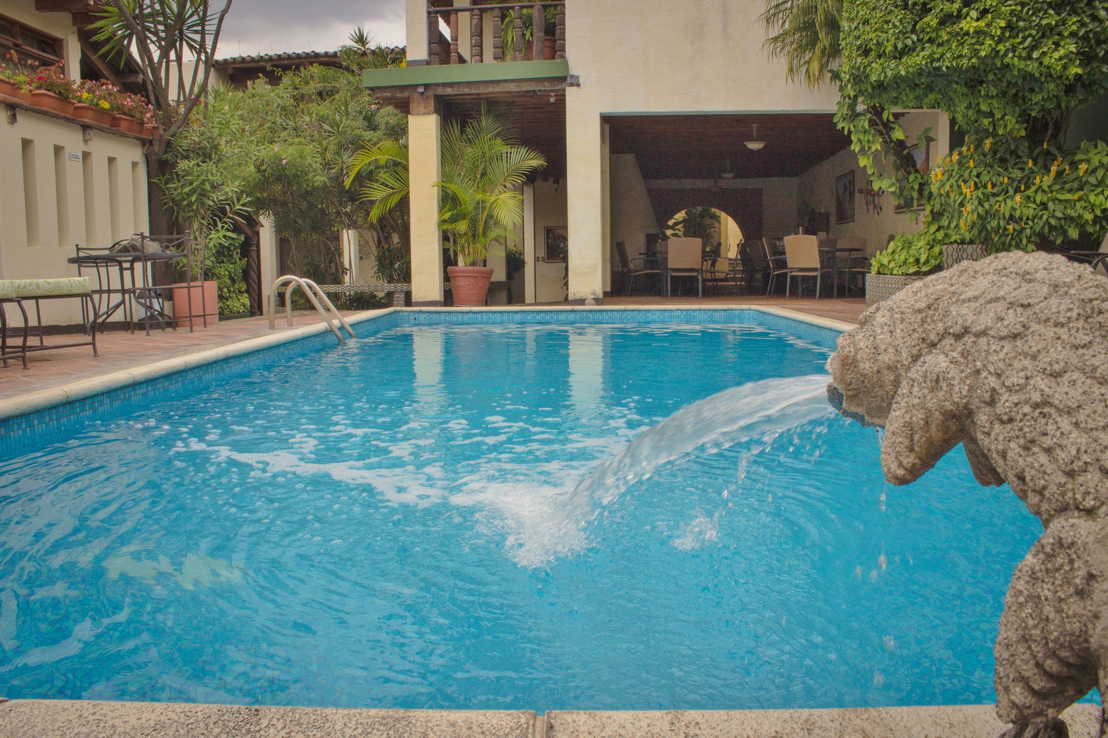 Outdoor pool, open 9:00 AM to 10:00 PM, sun loungers