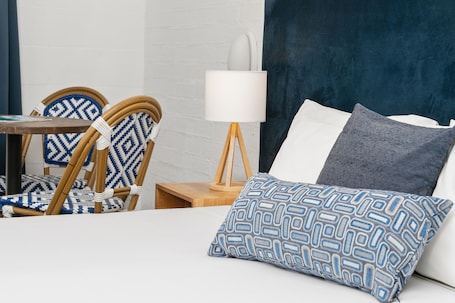 Pillow-top beds, desk, blackout curtains, soundproofing