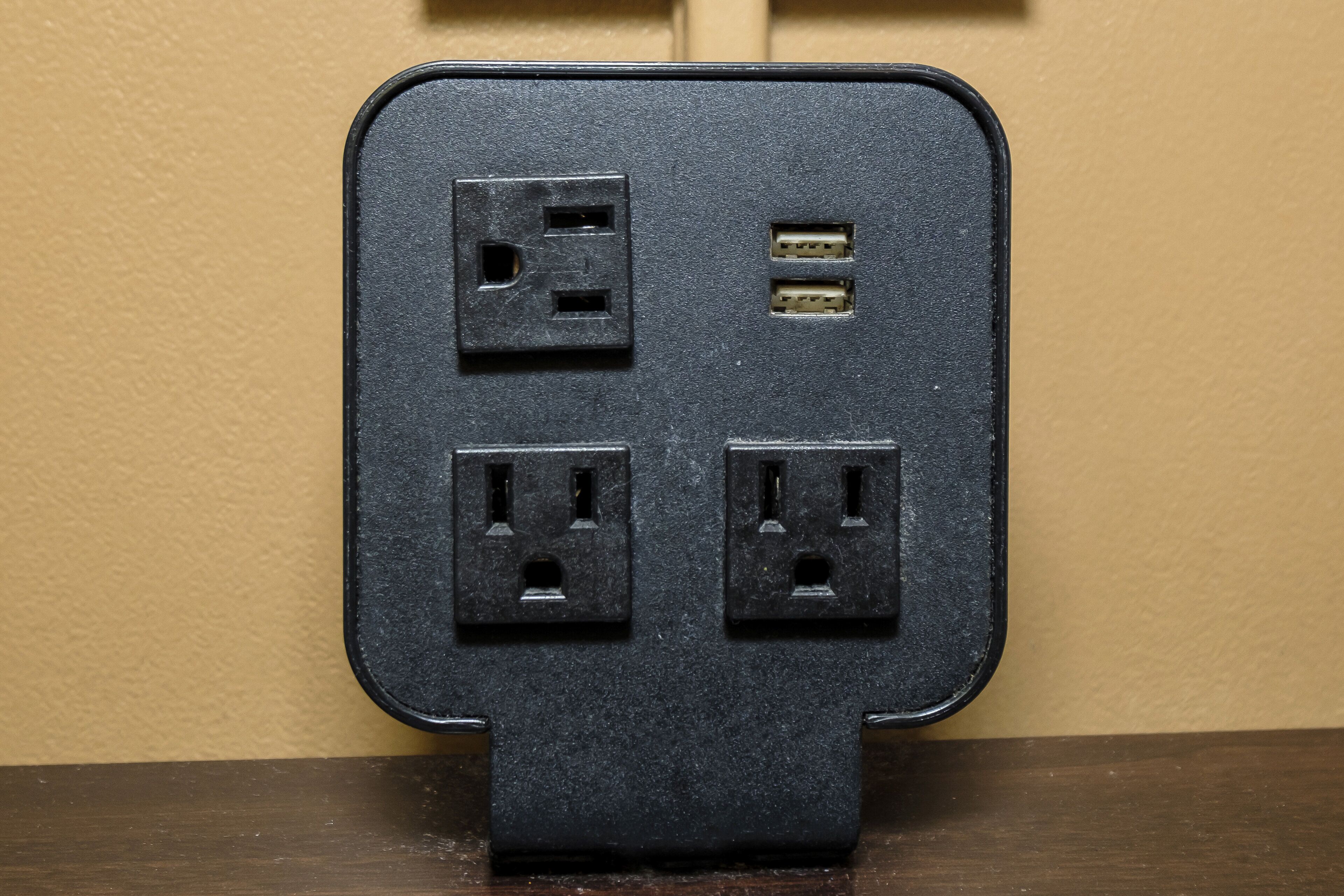 desk, laptop workspace, iron/ironing board, rollaway beds