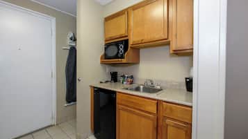 Suite, 2 Queen Beds (Smoke Free) | Desk, laptop workspace, iron/ironing board, rollaway beds