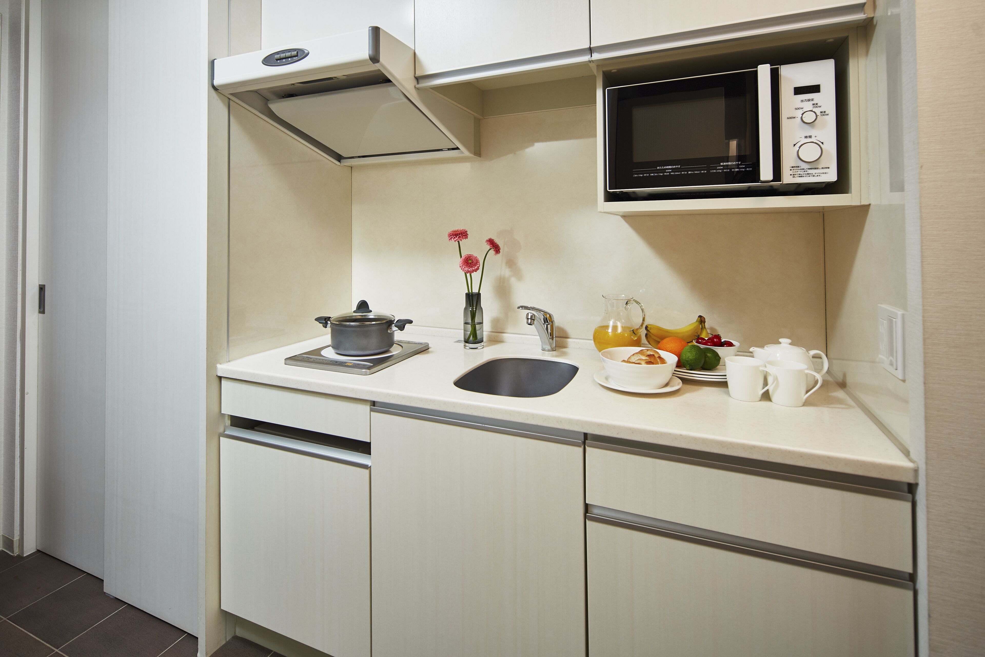 fridge, microwave, stovetop, electric kettle