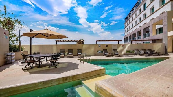 Outdoor pool, free pool cabanas, pool umbrellas