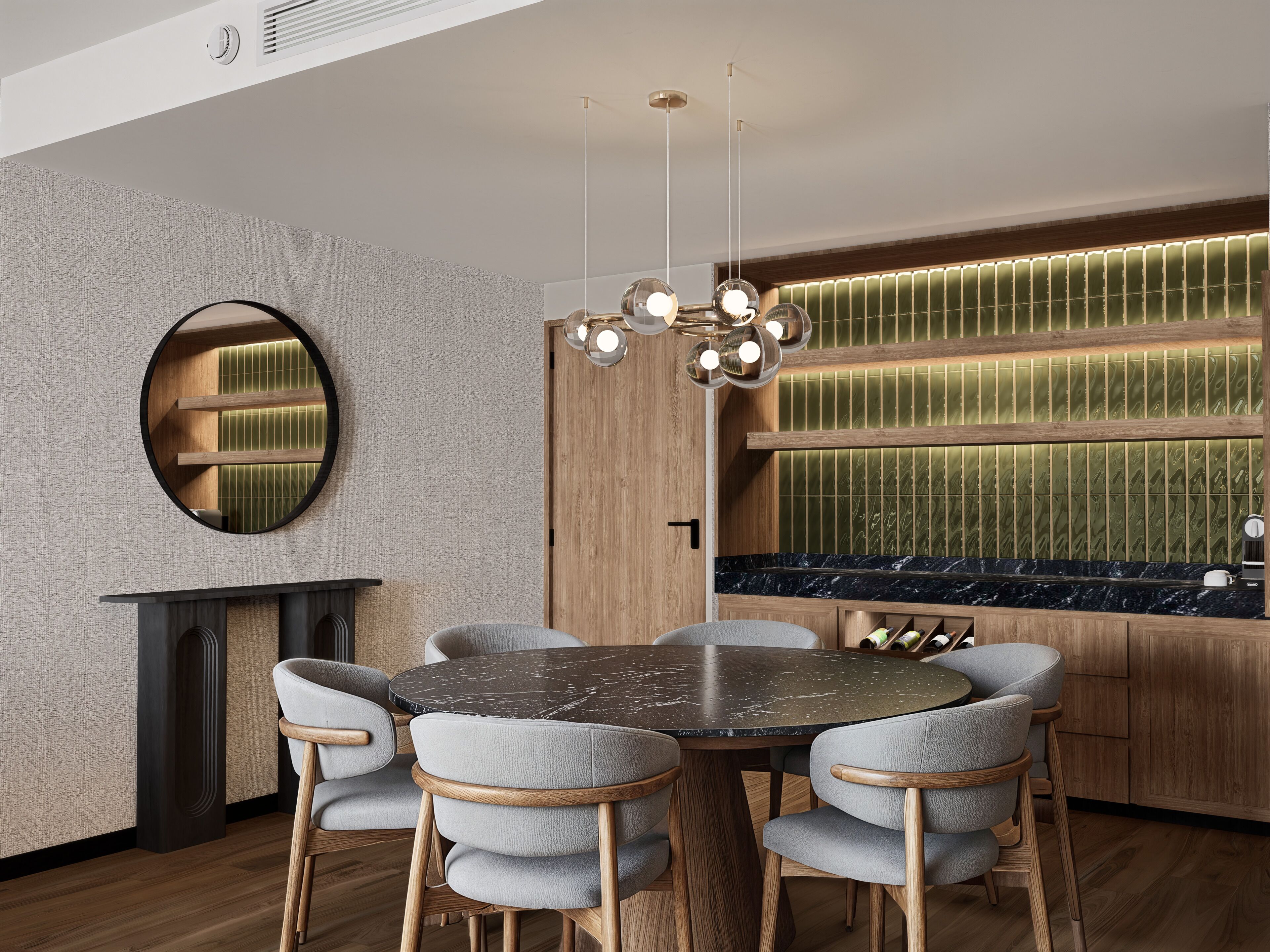 Un comedor moderno con una mesa redonda, seis sillas, un espejo circular y una encimera de cocina empotrada con salpicadero verde.