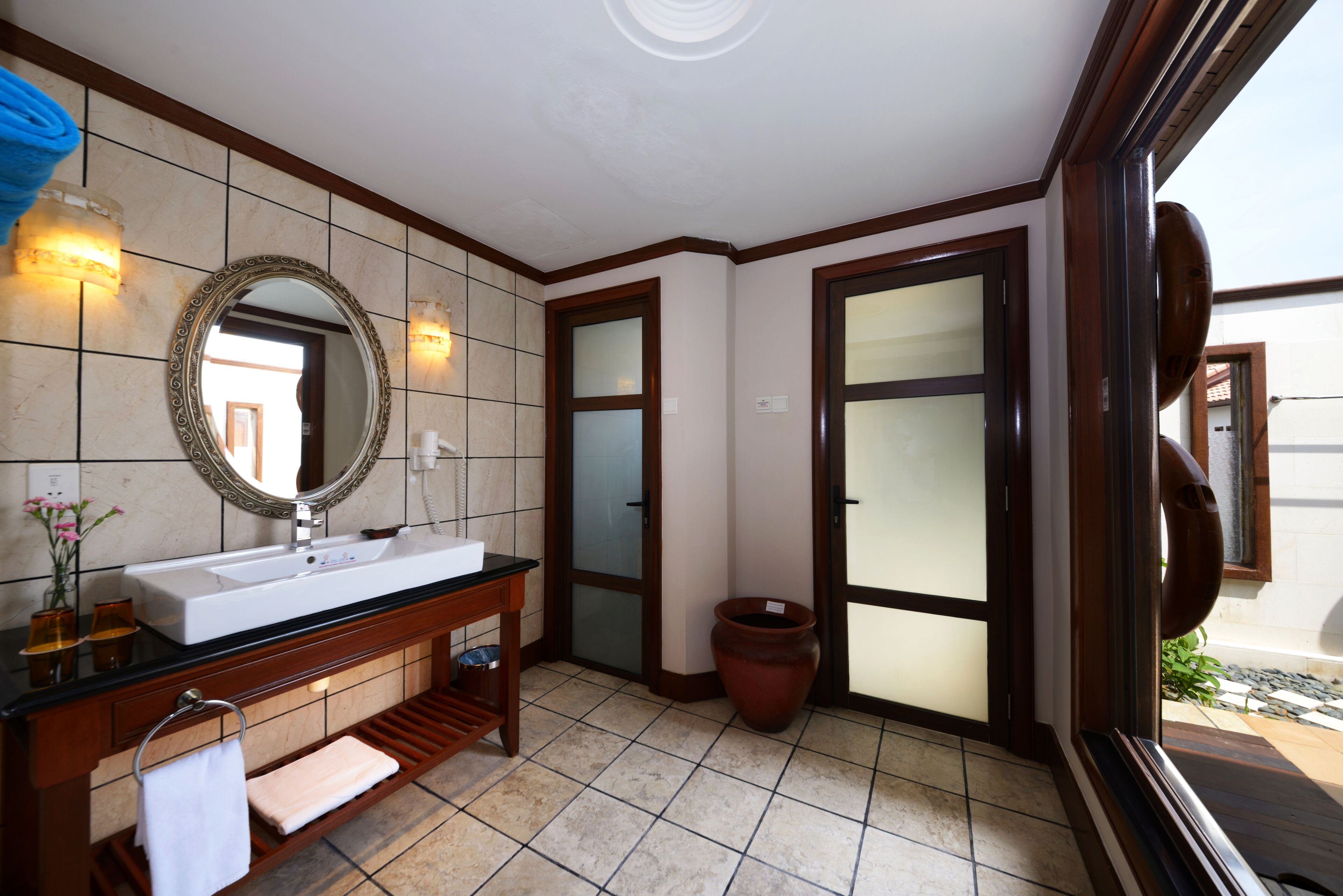 executive pool villa | bathroom | shower, rainfall showerhead, hair dryer, bathrobes
