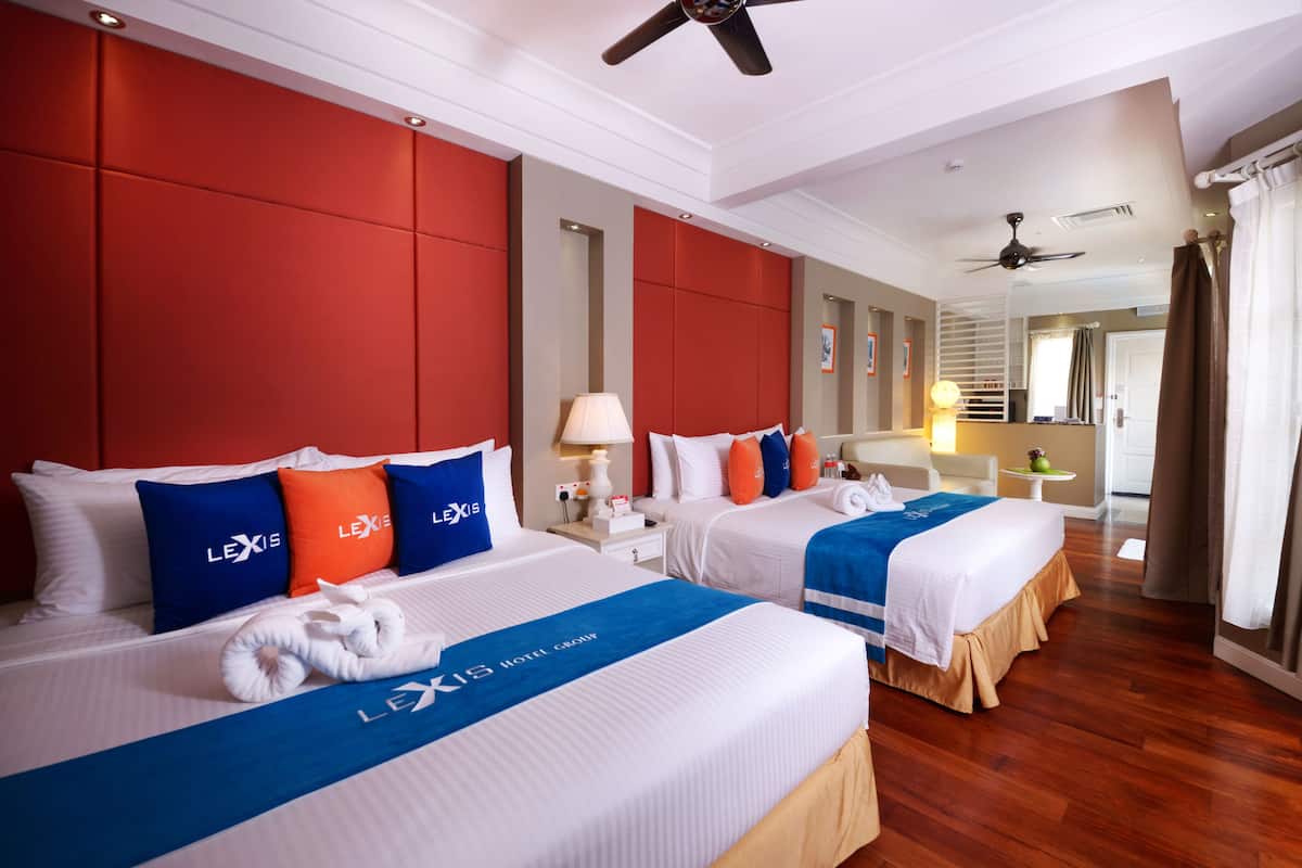 Suite Deluxe | Ropa de cama de alta calidad y minibar