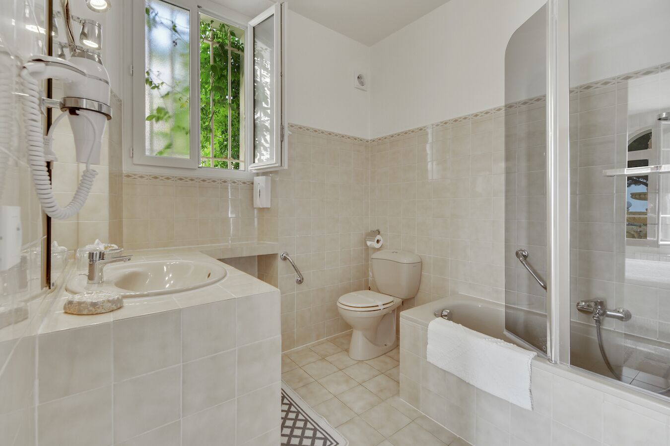 standard double room, private bathroom (431 agapanthe) | bathroom | combined shower/bathtub, free toiletries, hair dryer, slippers