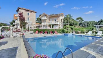 Outdoor pool, pool umbrellas, pool loungers