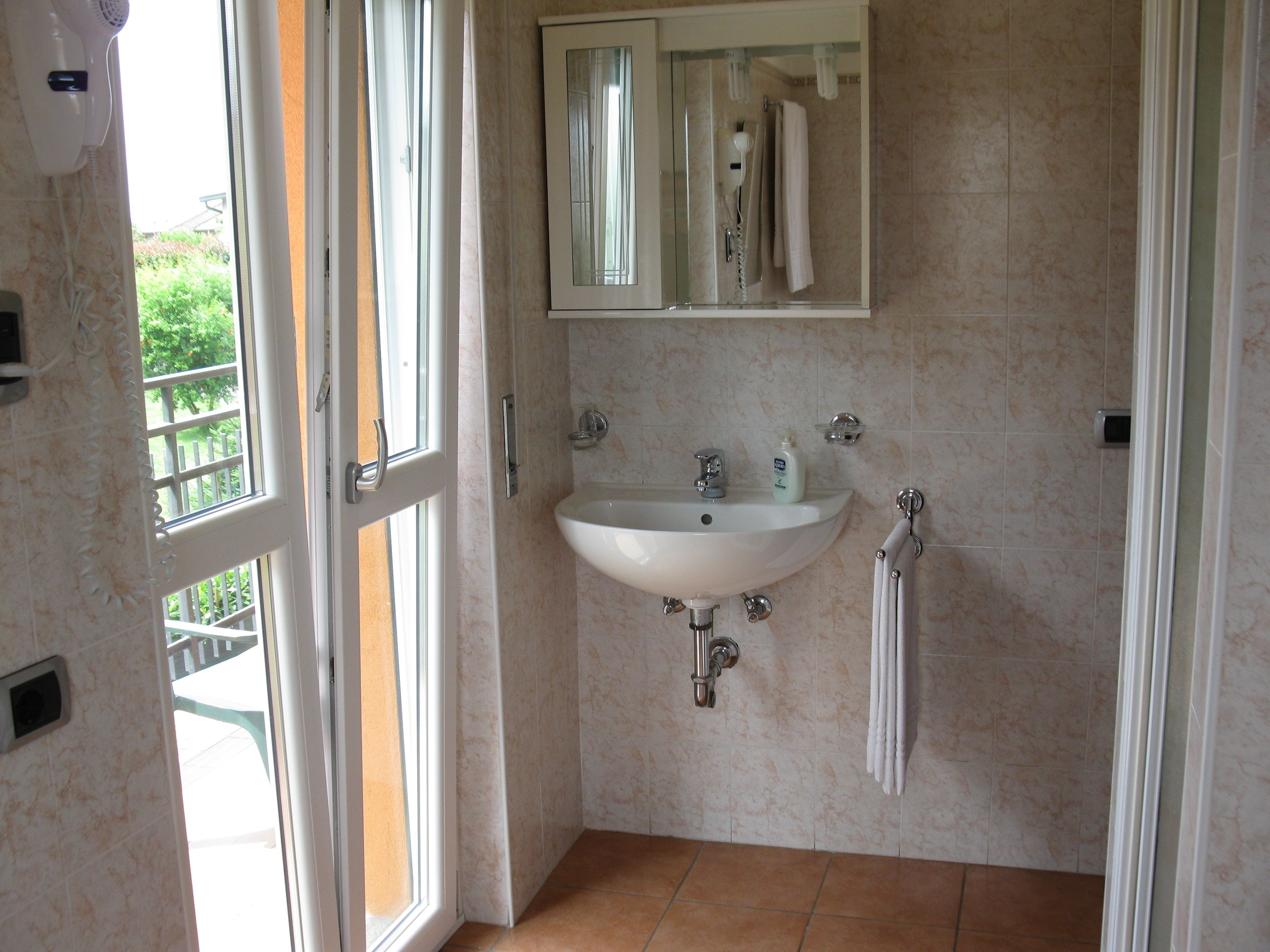 double room | bathroom | rainfall showerhead, free toiletries, hair dryer, bidet