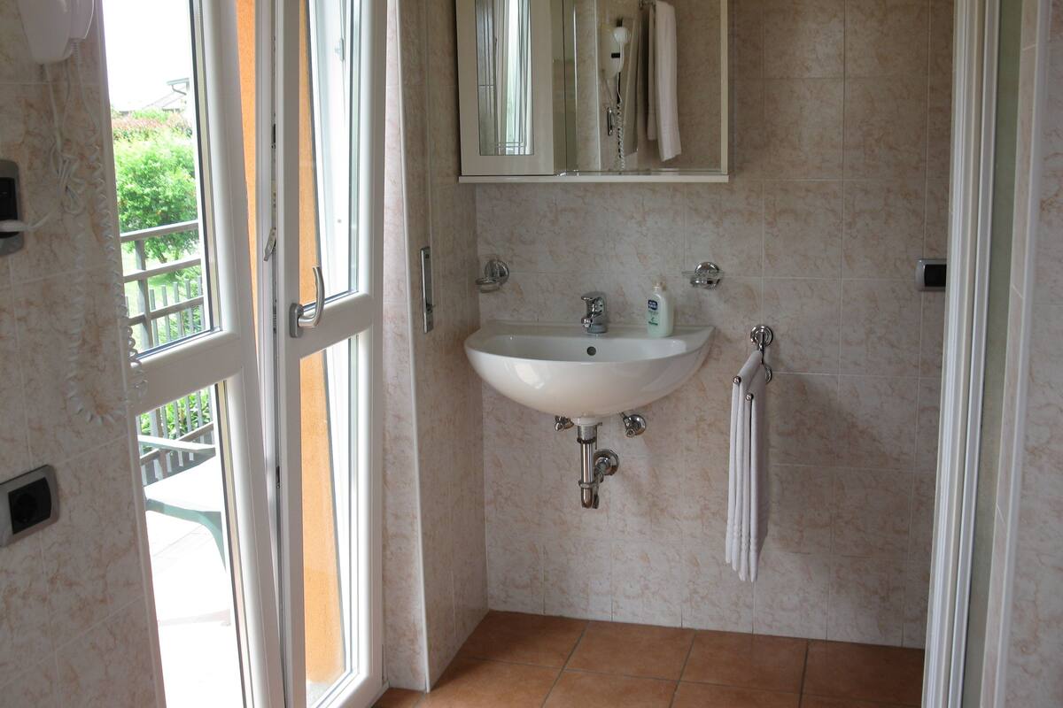 double room | bathroom | rainfall showerhead, free toiletries, hair dryer, bidet