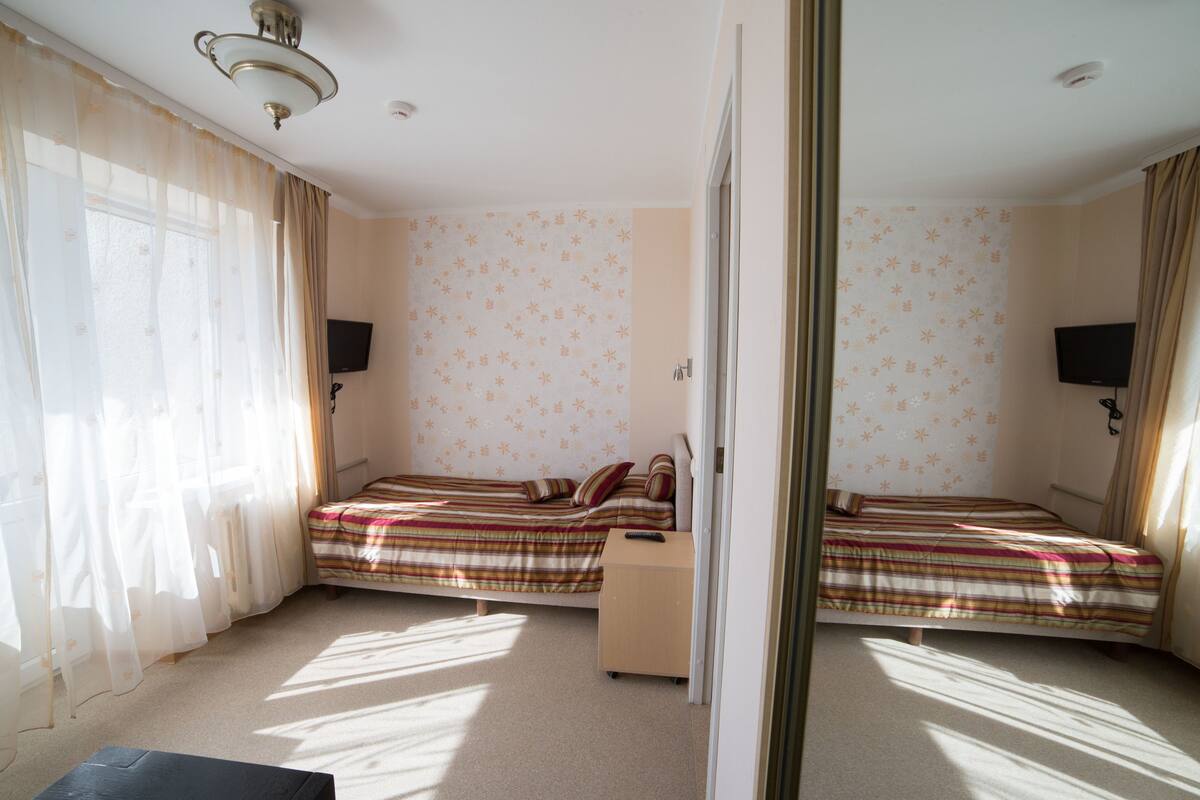 Single Room | Iron/ironing board (on request), cribs (surcharge), bed sheets