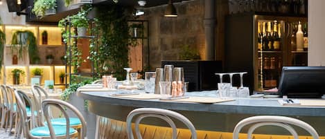 Breakfast, lunch, dinner served; local cuisine, al fresco dining