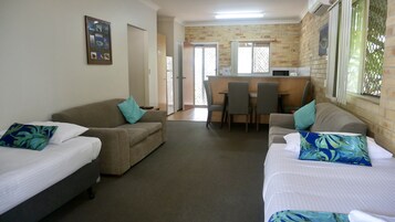 Family Apartment | Living area | 40-inch LCD TV with digital channels