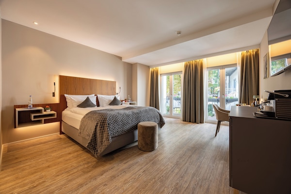 Ropa de cama de alta calidad y minibar