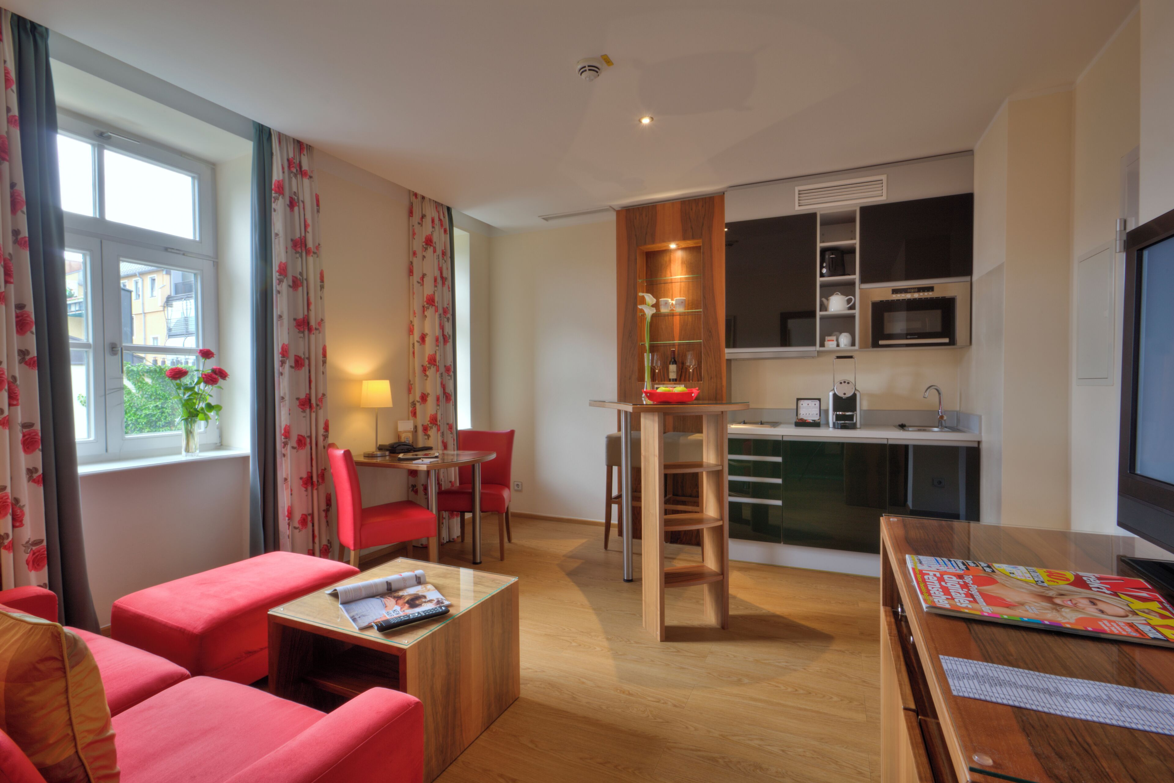 junior suite | living area | flat-screen tv