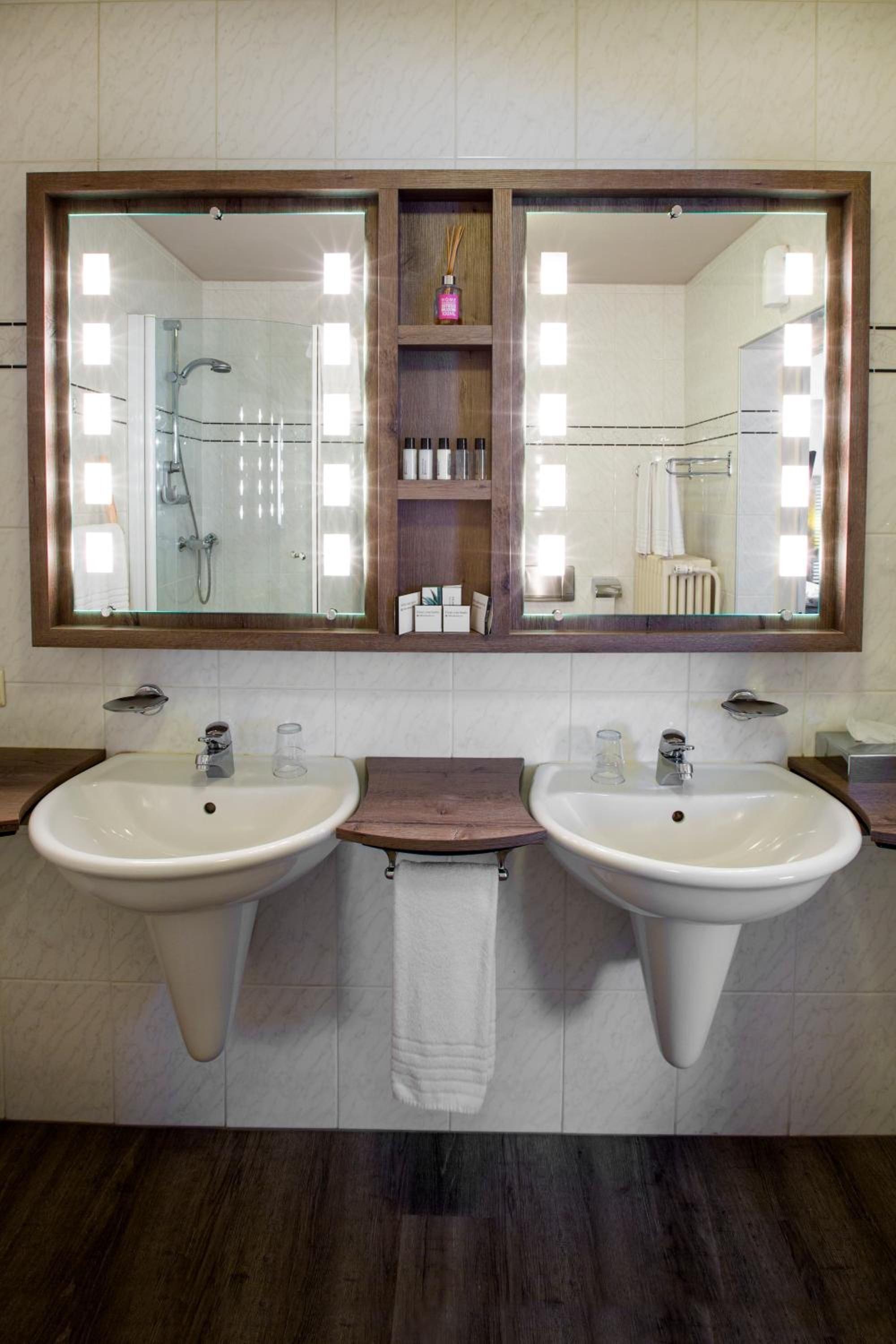 eco-friendly toiletries, hair dryer, towels