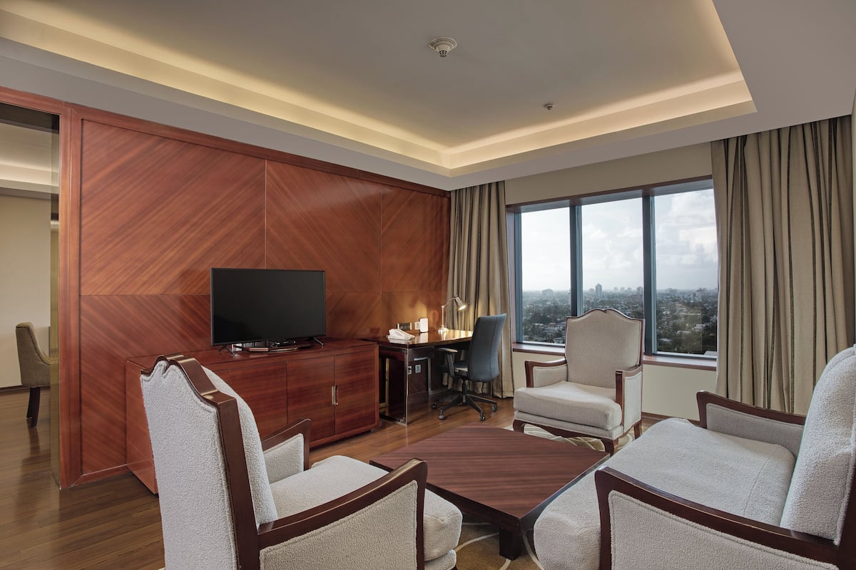 room, 1 king bed (living dining) | 1 bedroom, premium bedding, minibar, in-room safe