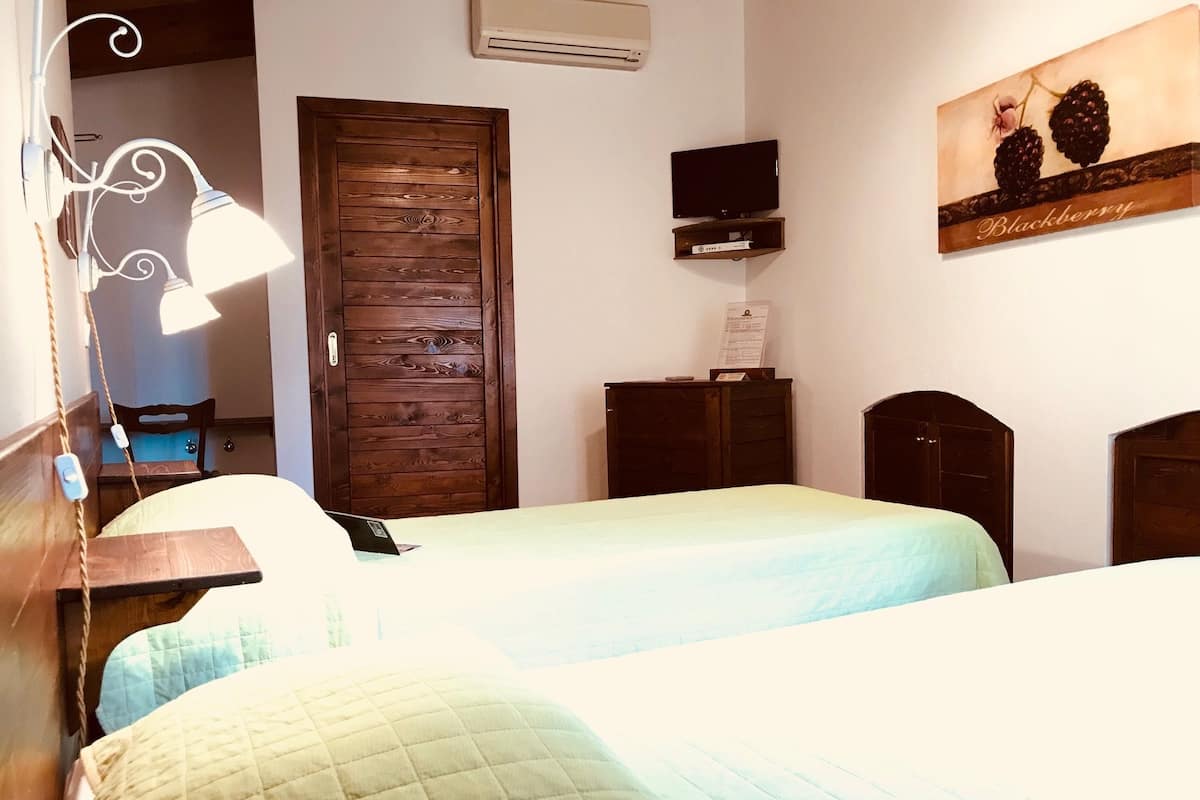 Eenpersoonskamer | Een minibar, gratis wifi, beddengoed