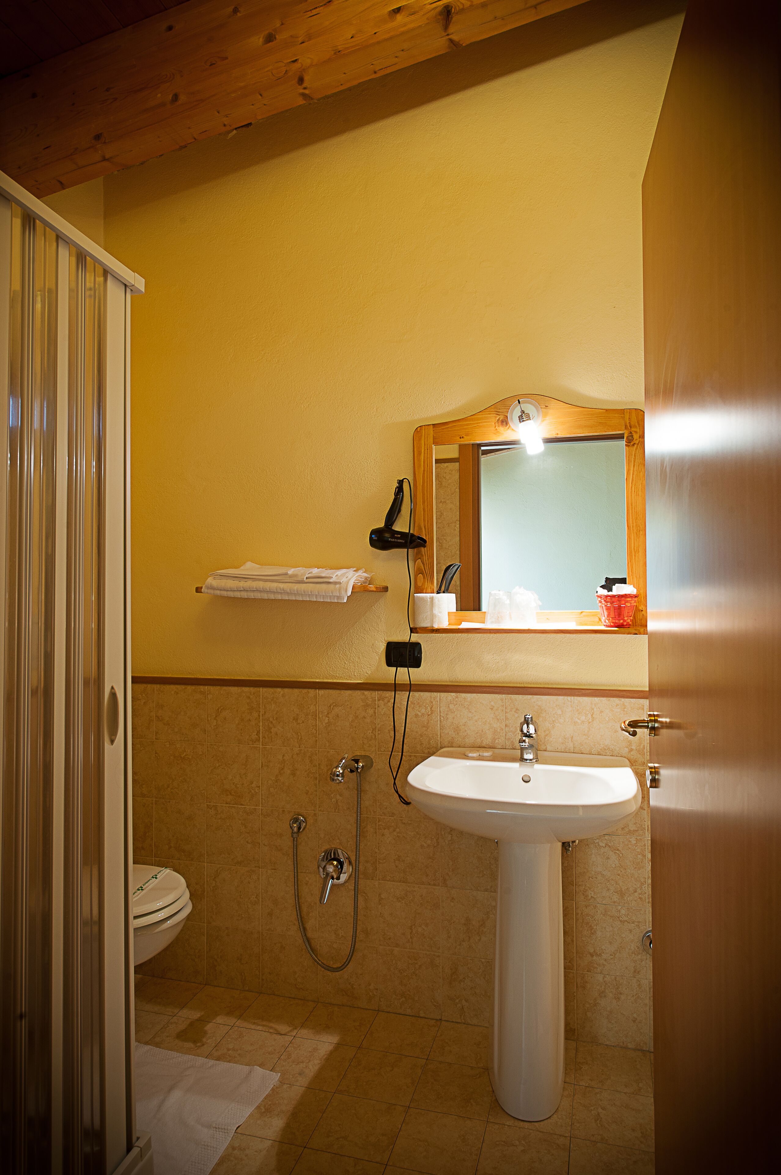 double or twin room | bathroom | shower, hair dryer, towels, shampoo