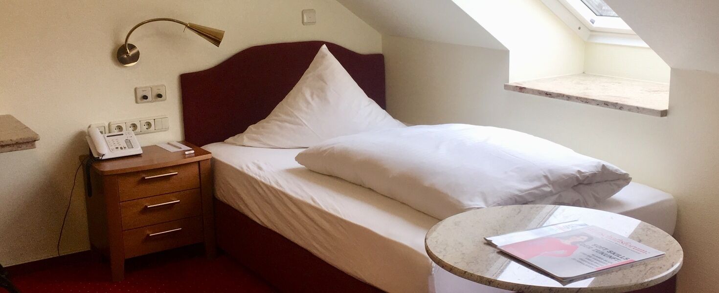 Hypo-allergenic bedding, minibar, in-room safe, desk