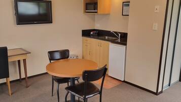 Executive Studio with King Bed | Private kitchen