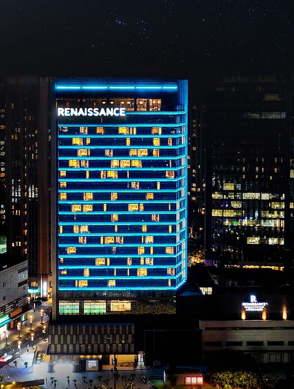 A tall building with the name 'RENAISSANCE' prominently displayed at the top.