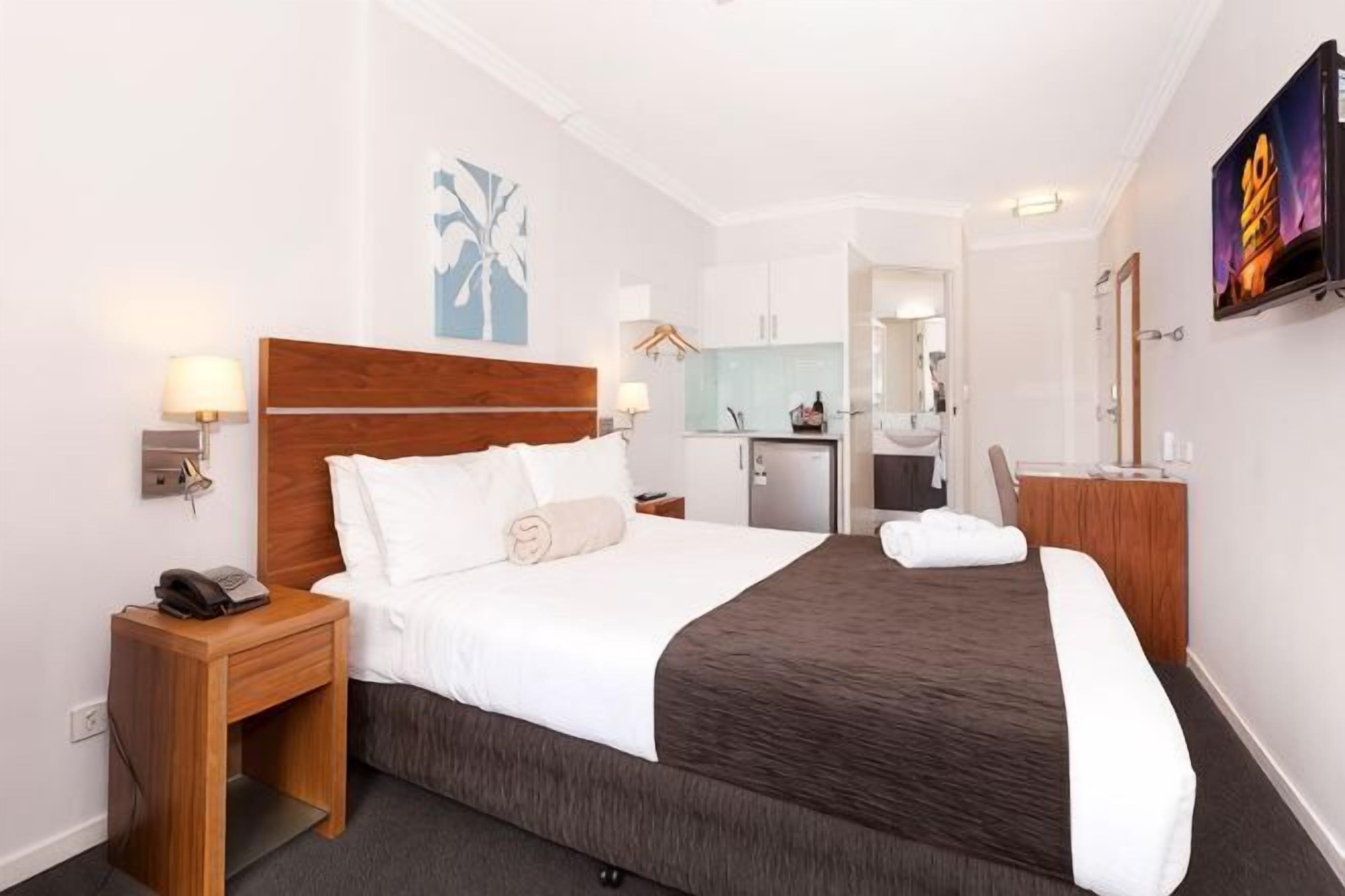 Desk, laptop workspace, free WiFi, bed sheets