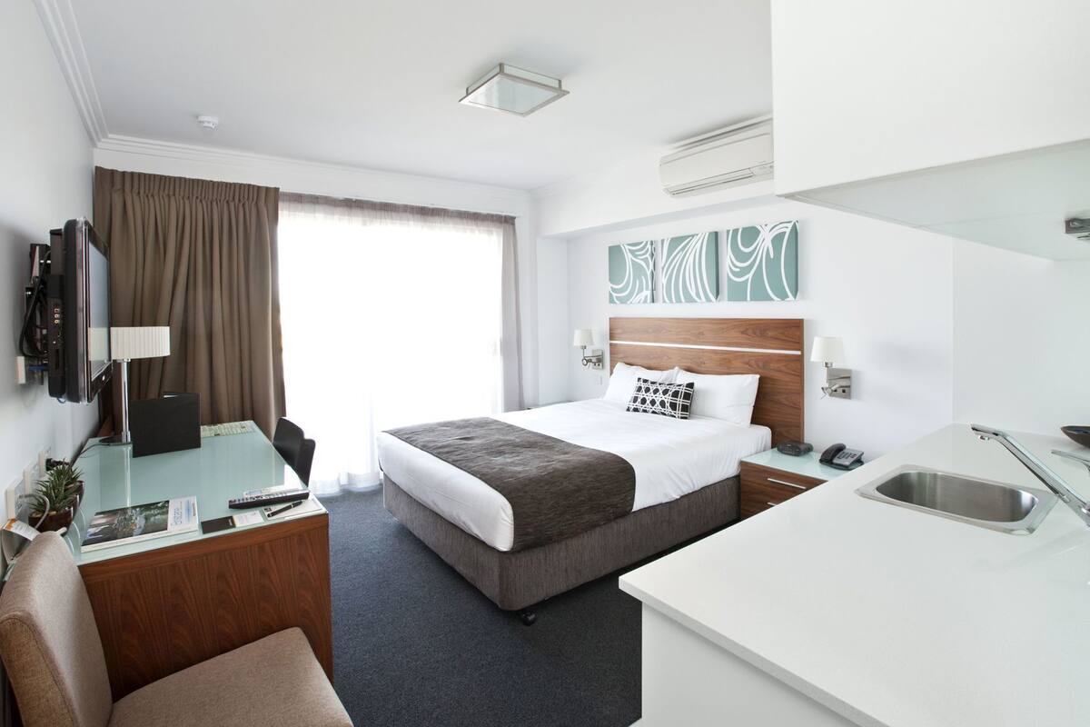 Desk, laptop workspace, free WiFi, bed sheets