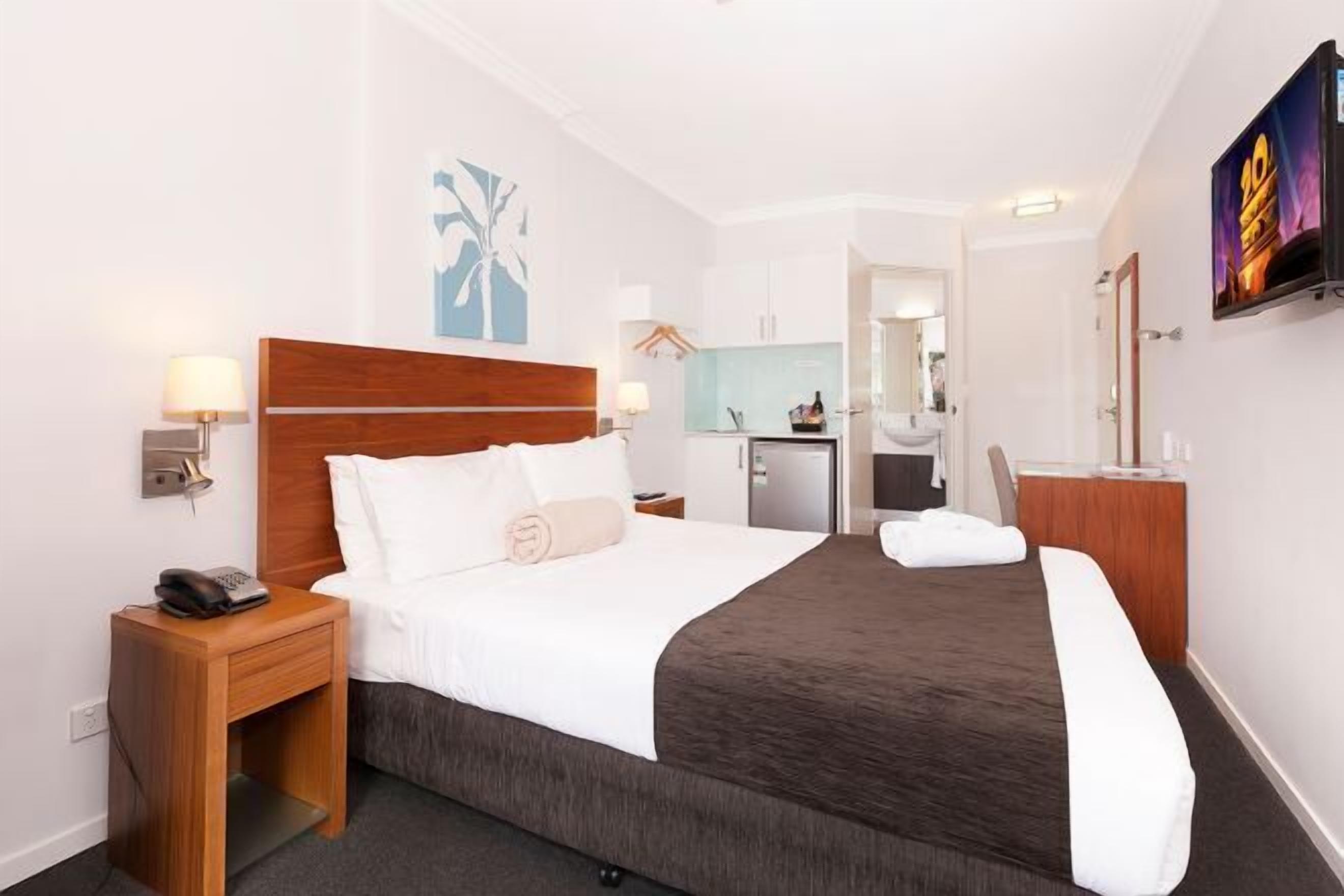 Desk, laptop workspace, free WiFi, bed sheets