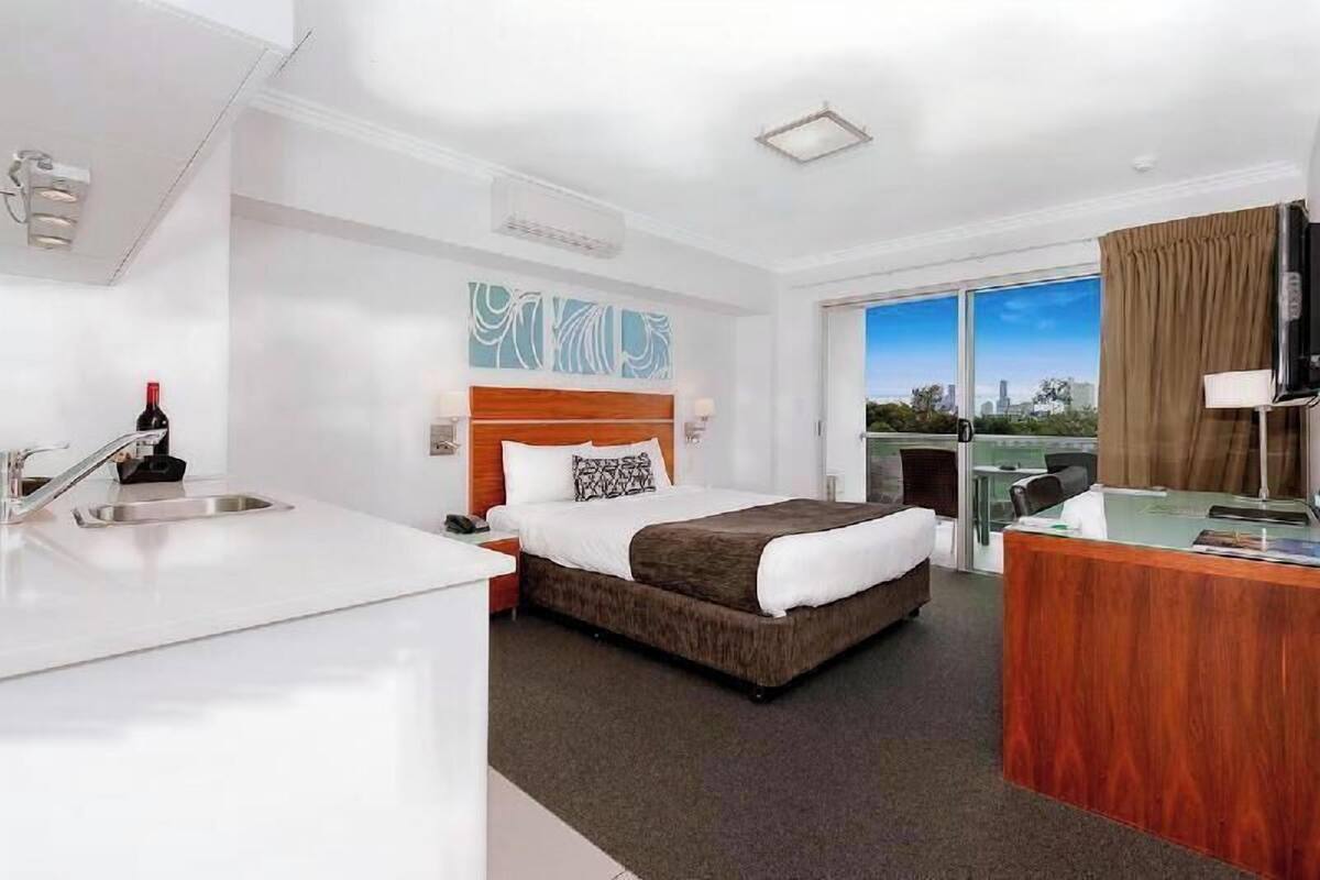 Desk, laptop workspace, free WiFi, bed sheets