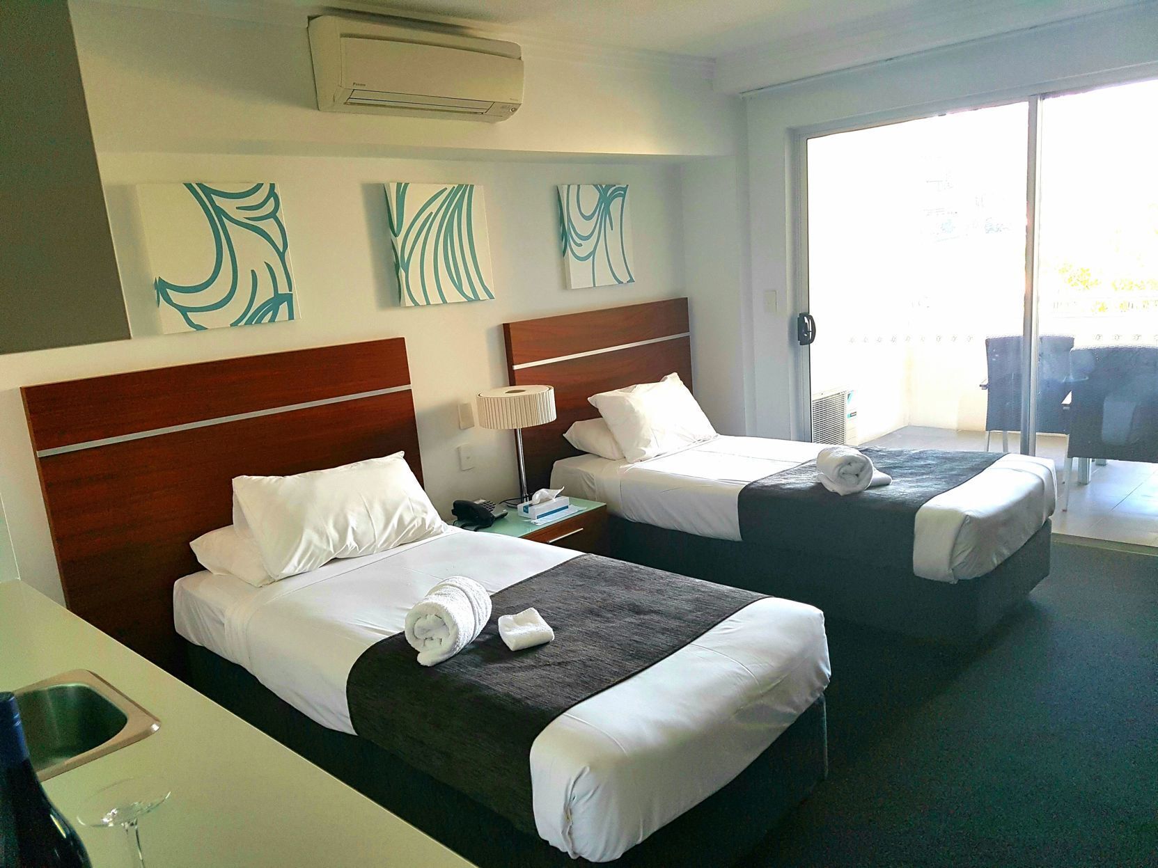 Desk, laptop workspace, free WiFi, bed sheets