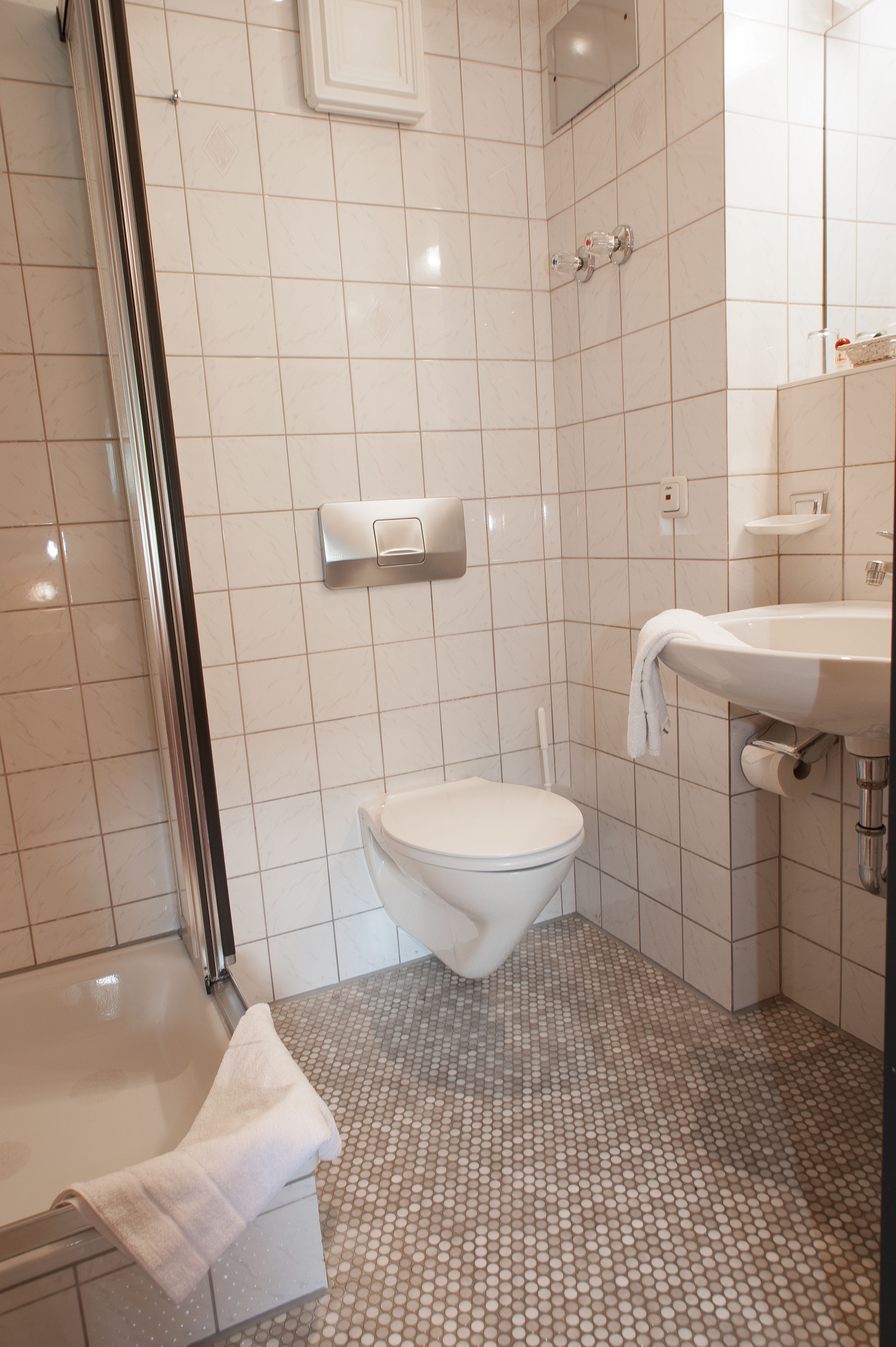 hair dryer, slippers, towels