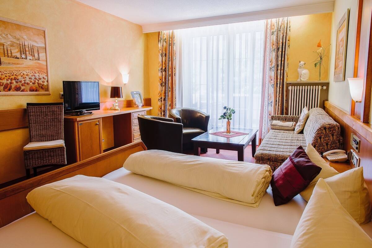 deluxe room, balcony, garden view | hypo-allergenic bedding, iron/ironing board, free wifi, bed sheets