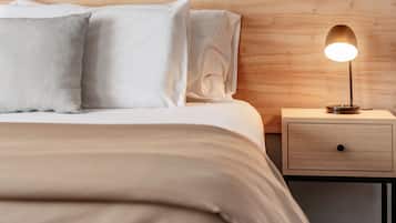 Premium bedding, down comforters, pillowtop beds, minibar