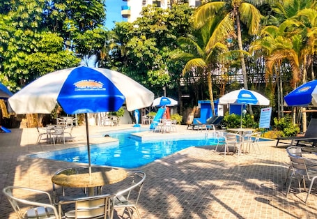 Outdoor pool, pool umbrellas, sun loungers