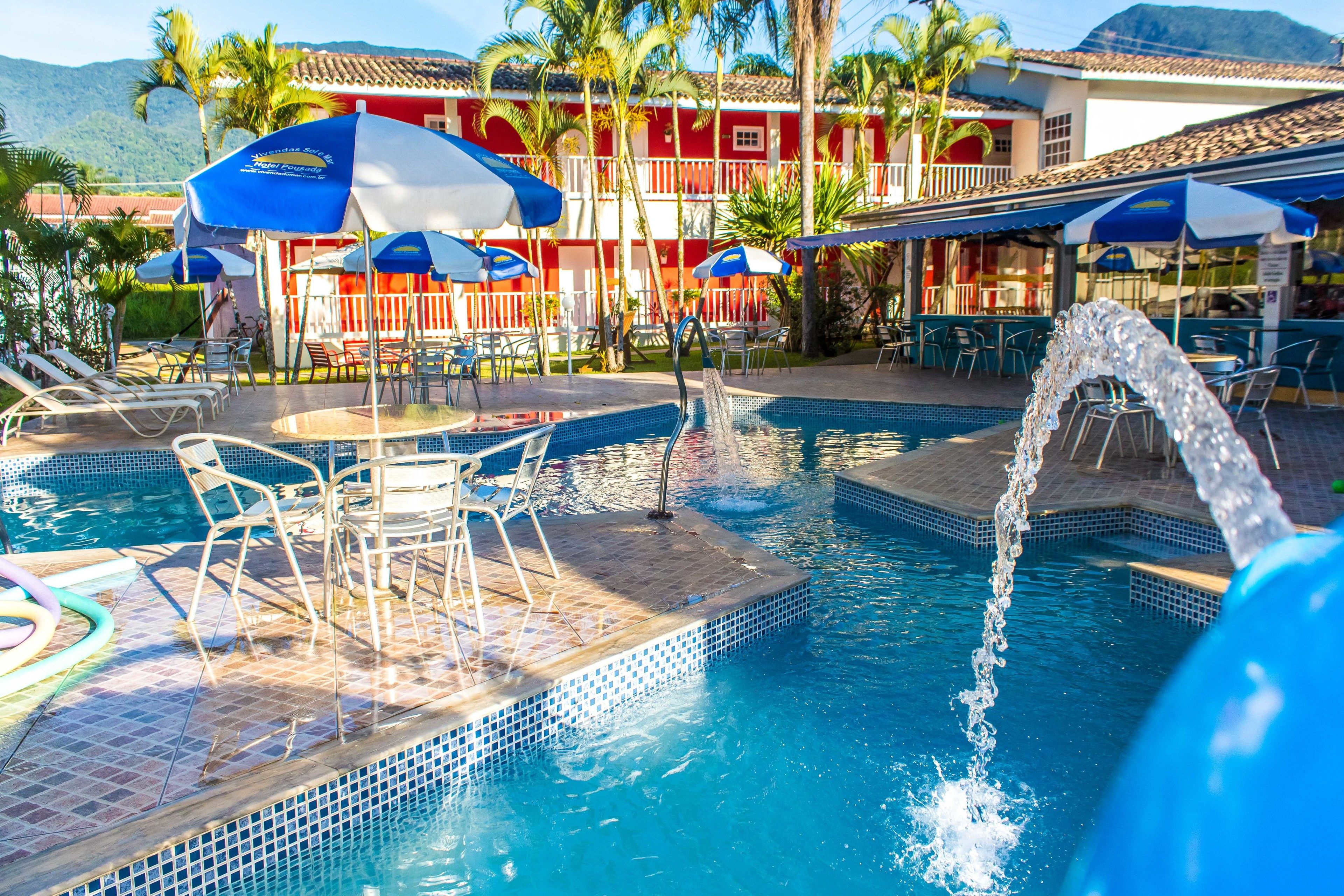 outdoor pool, pool umbrellas, pool loungers