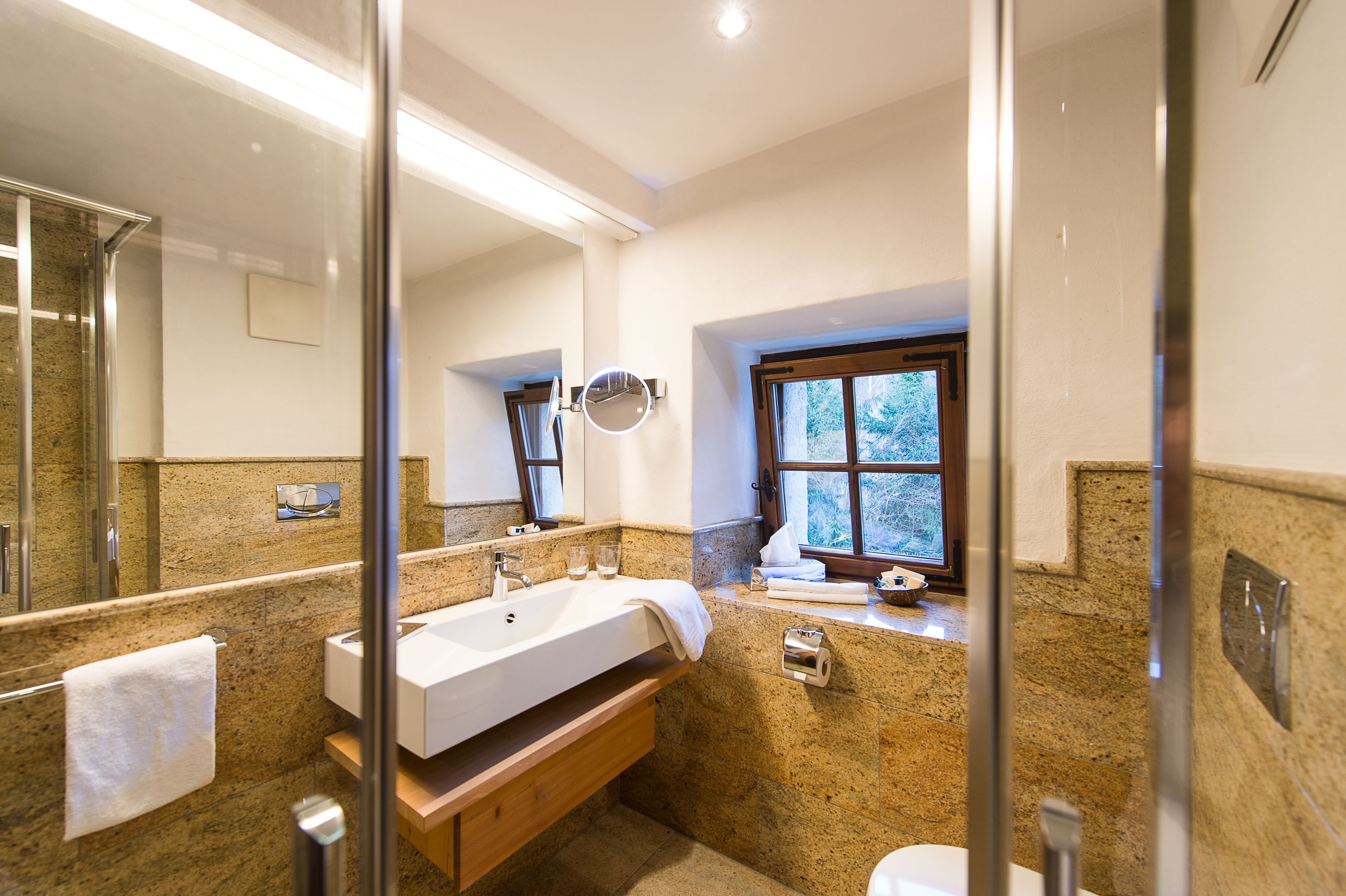 hydromassage showerhead, designer toiletries, hair dryer, bathrobes