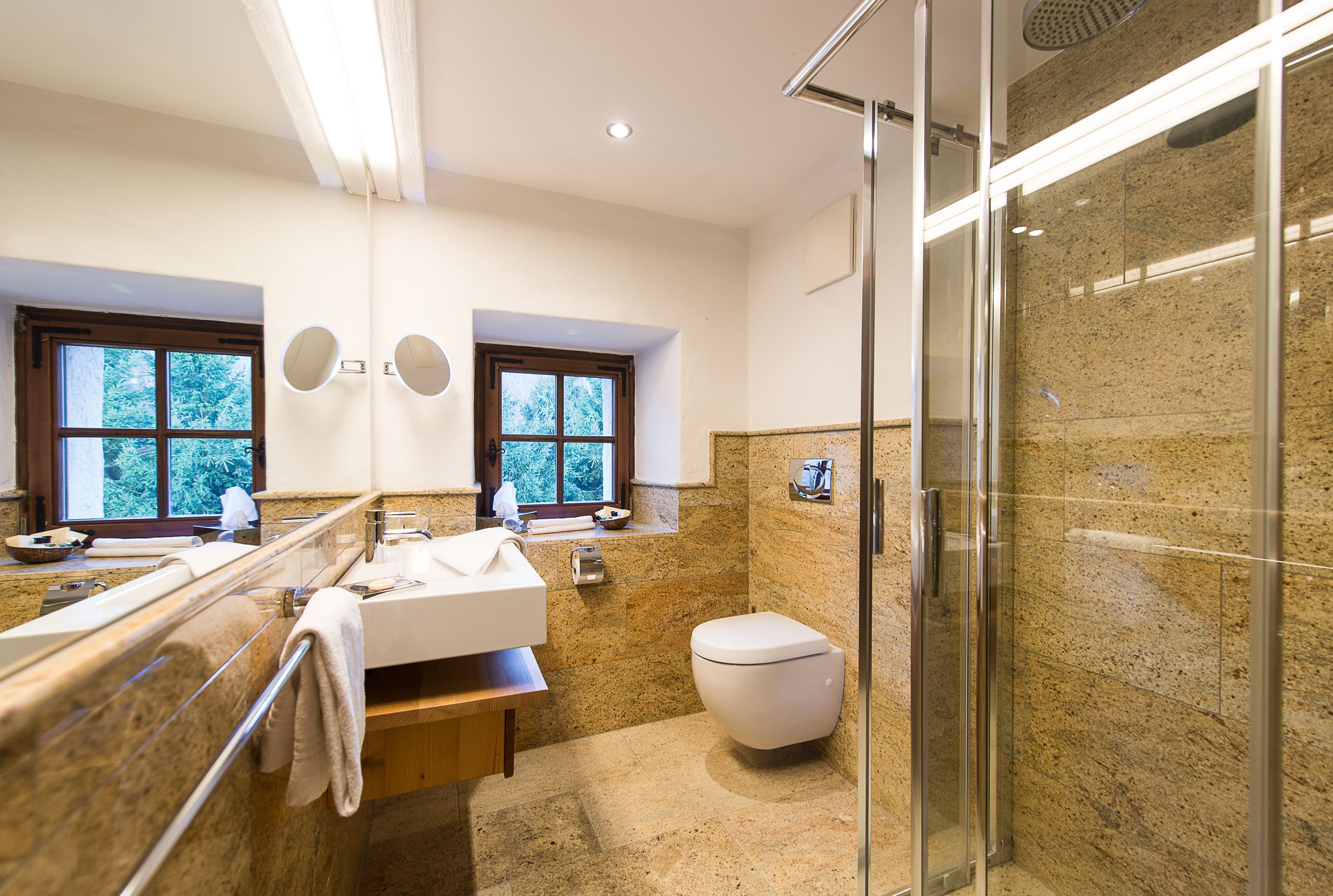 hydromassage showerhead, designer toiletries, hair dryer, bathrobes