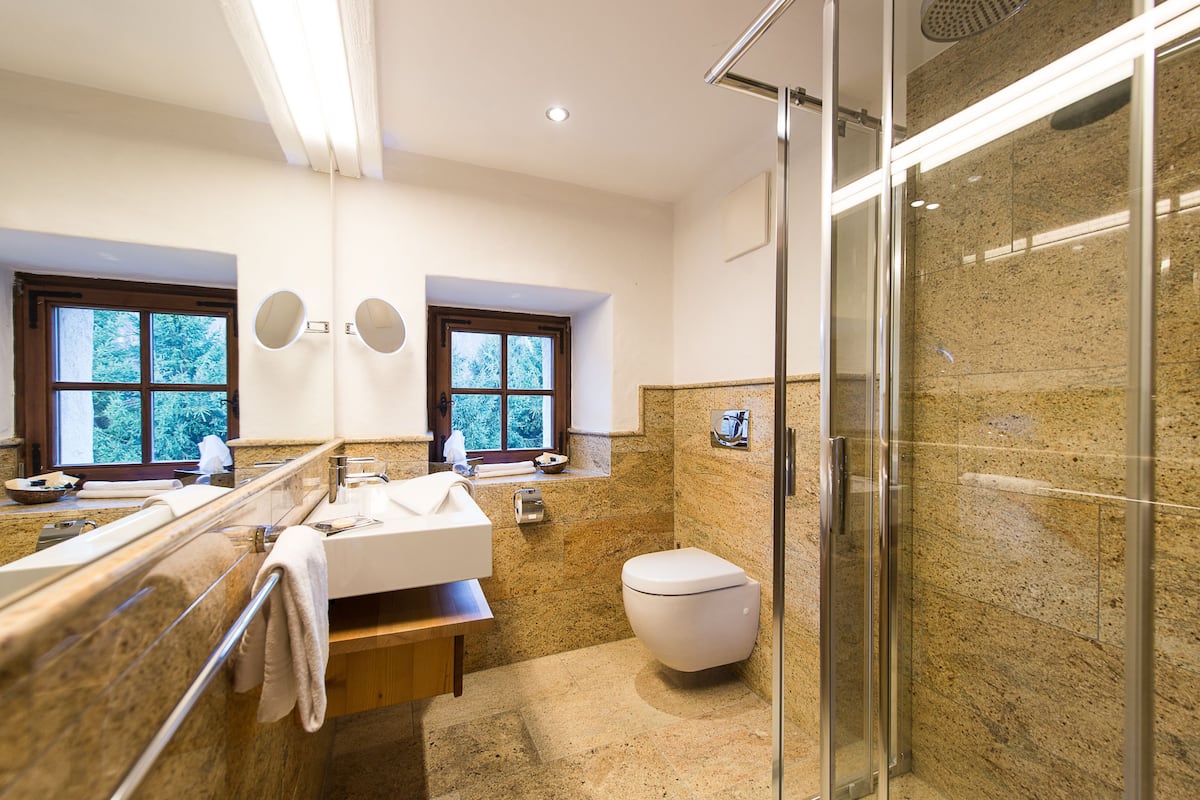 hydromassage showerhead, designer toiletries, hair dryer, bathrobes