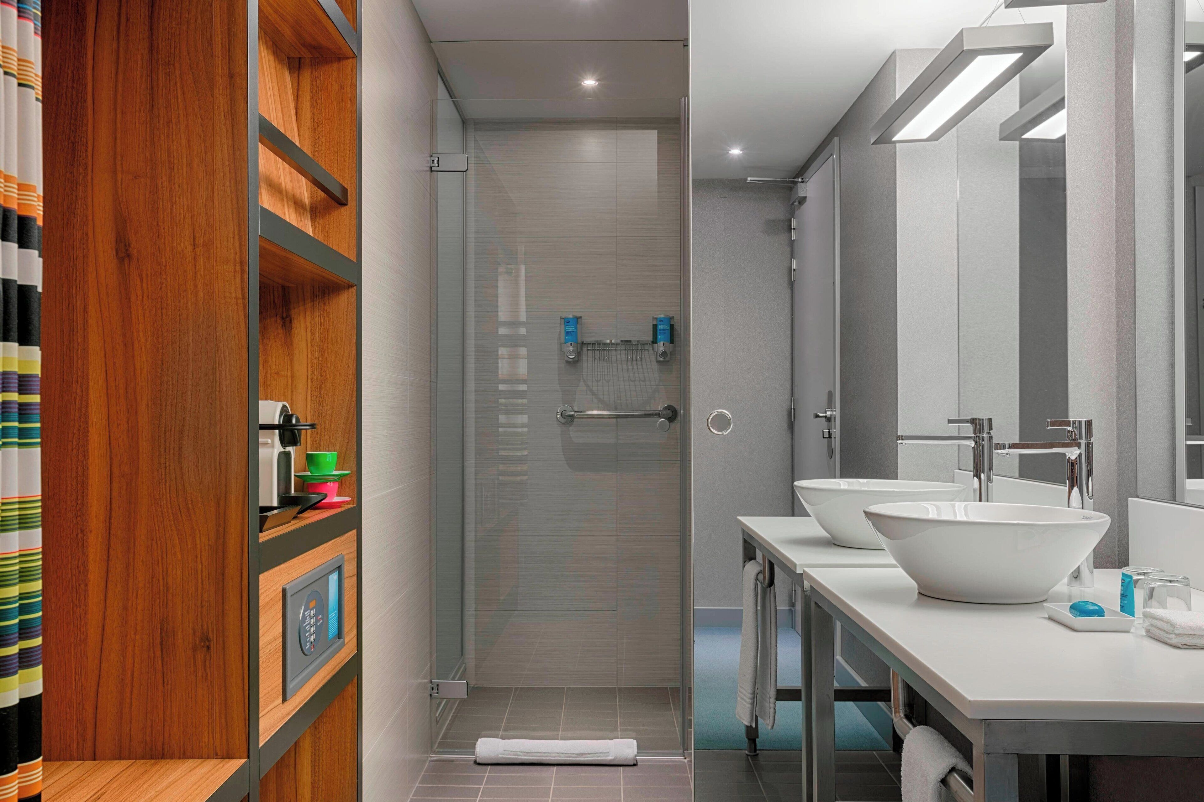 shower, eco-friendly toiletries, hair dryer, towels