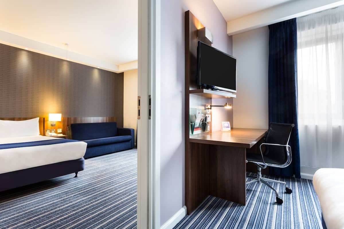 In-room safe, desk, blackout drapes, free cribs/infant beds