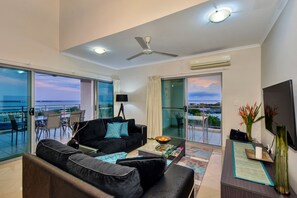 Premium Penthouse, 4 Bedrooms | Living area | 42-inch Smart TV with cable channels - Argus Apartments Darwin (Darwin)