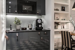 Luxury Room, 1 King Bed | Coffee and/or coffee maker