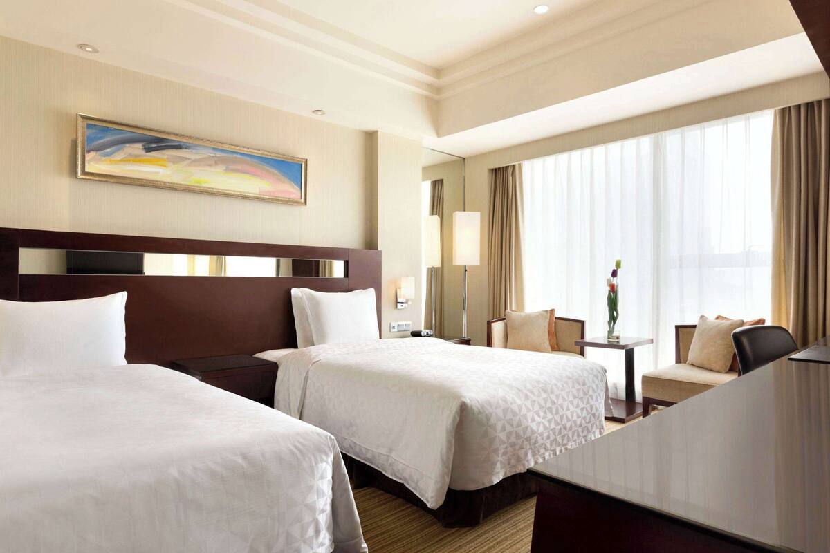 Hypoallergeen beddengoed, pillowtop-bedden, een minibar