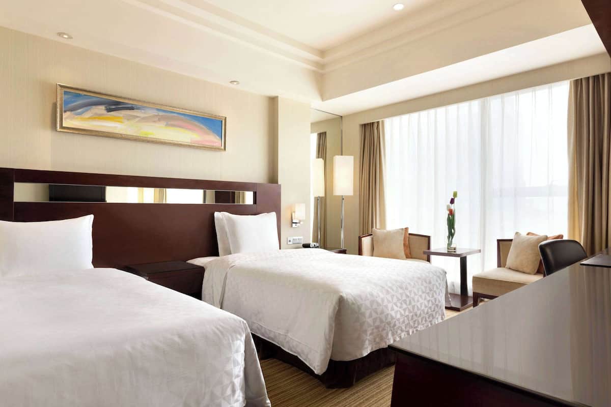 Hypo-allergenic bedding, pillow-top beds, minibar, in-room safe