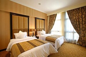 Ropa de cama de alta calidad, colchones con pillow-top y minibar 