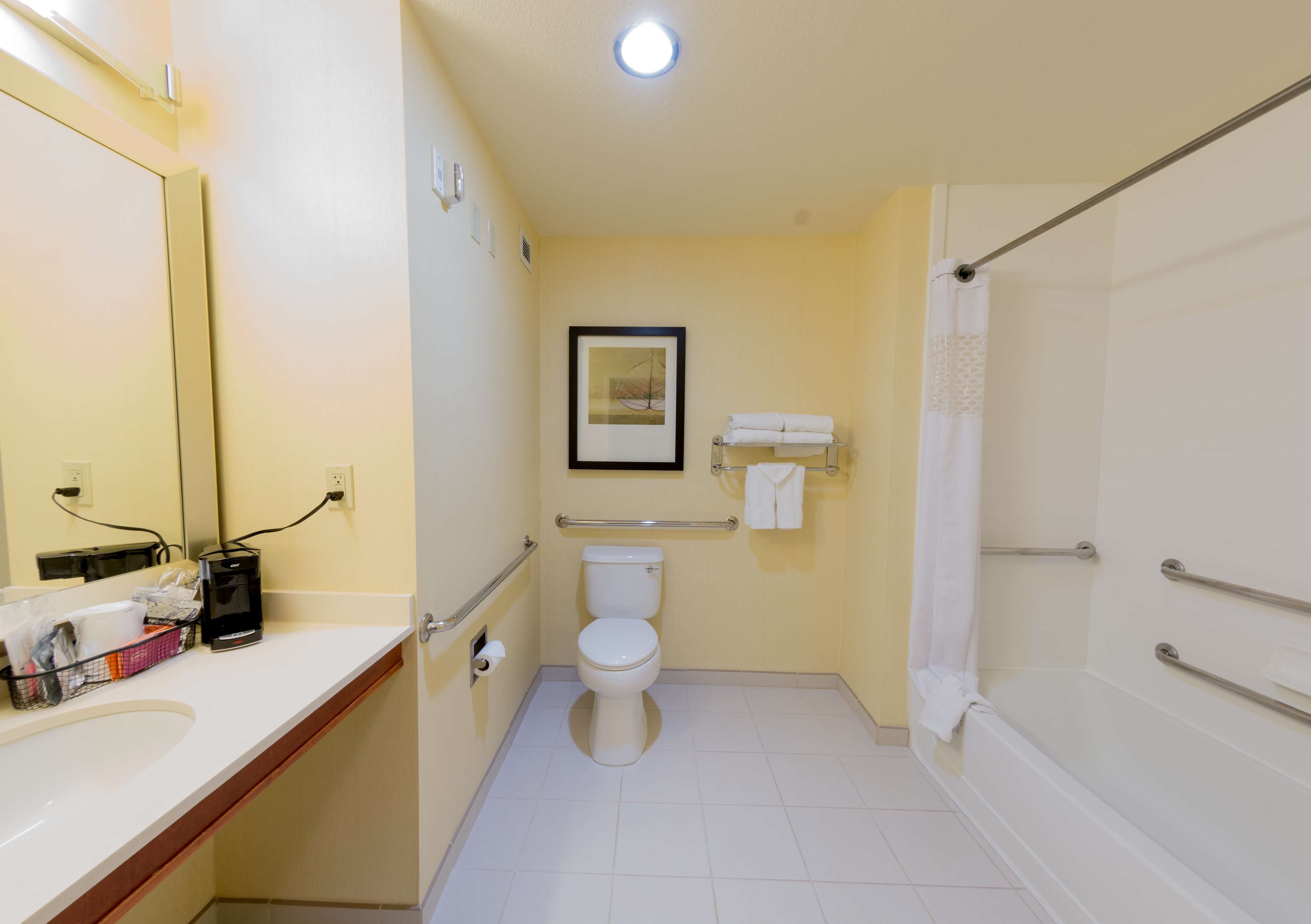 combined shower/bathtub, free toiletries, hair dryer, bathrobes