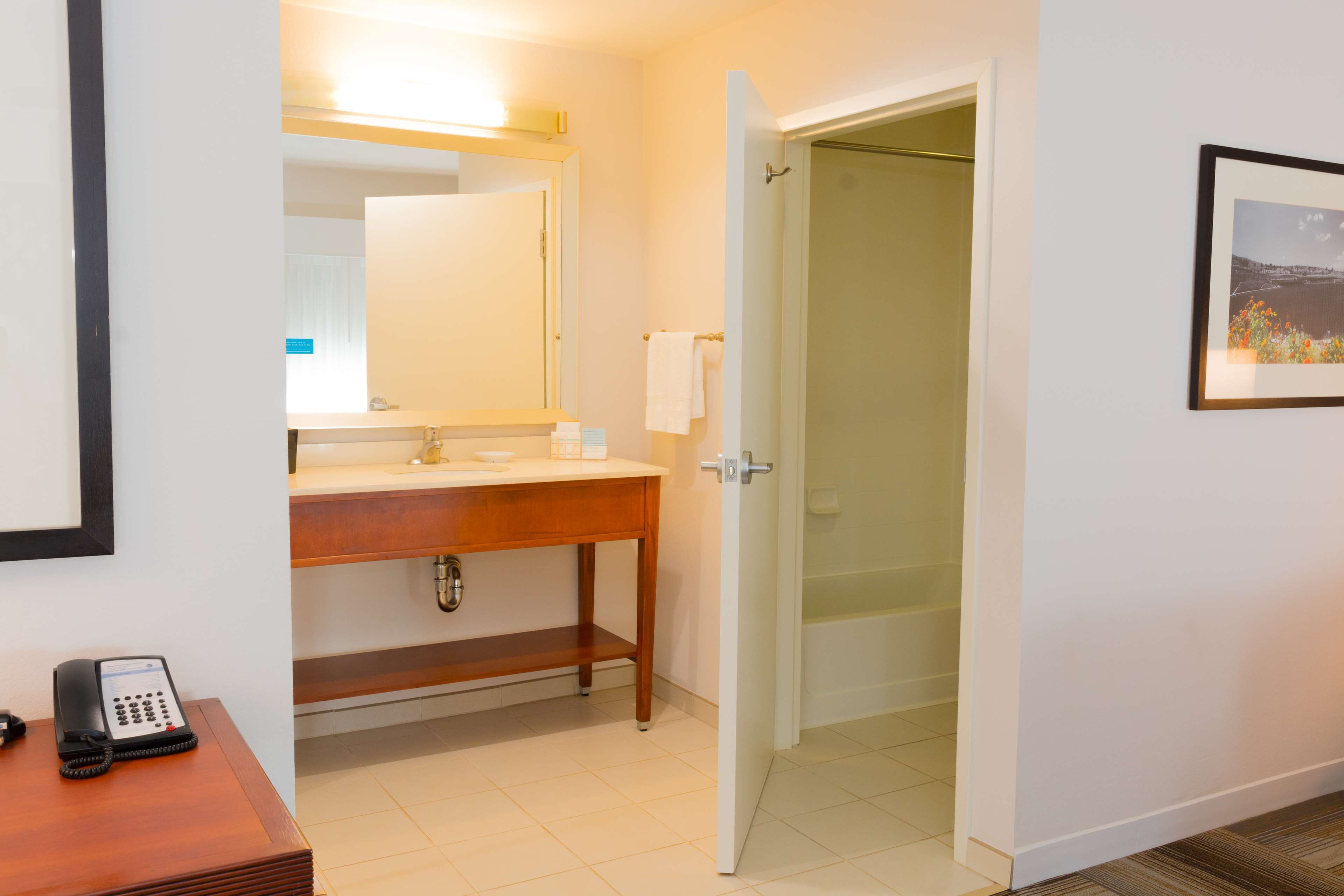 combined shower/bathtub, free toiletries, hair dryer, bathrobes