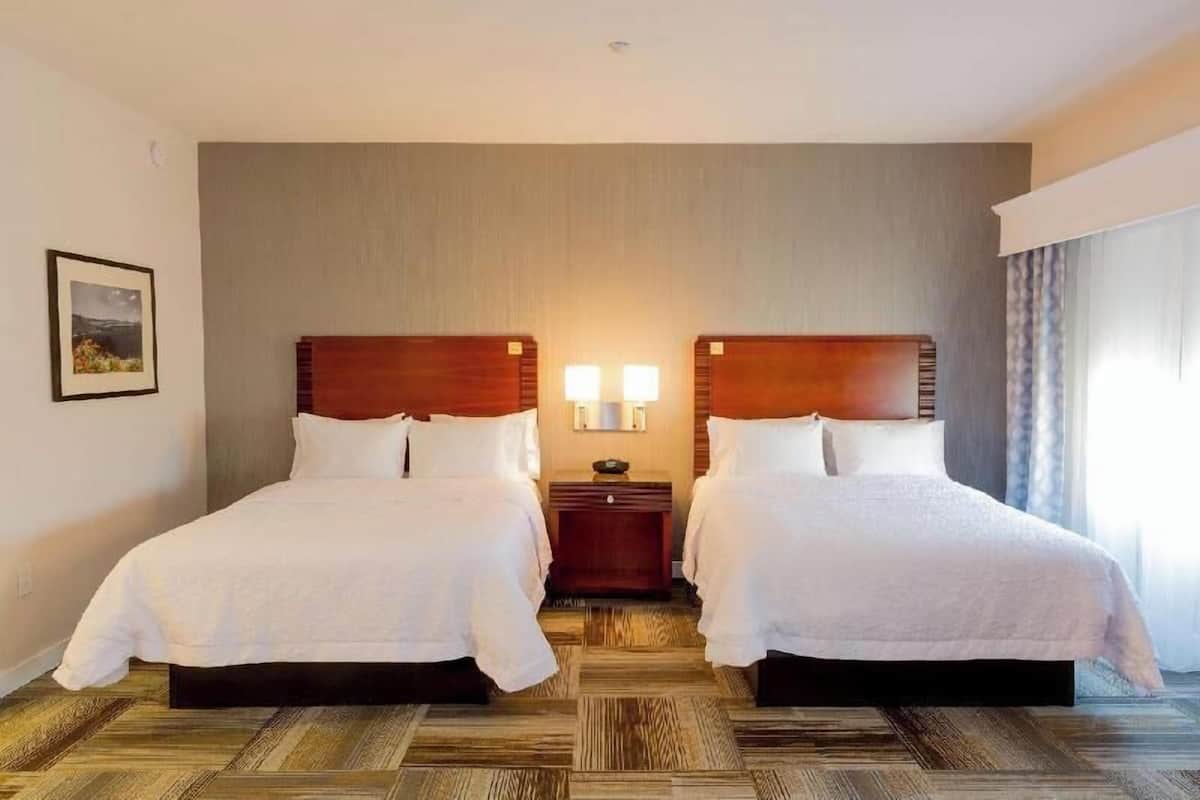 Premium bedding, down duvets, blackout curtains, iron/ironing board