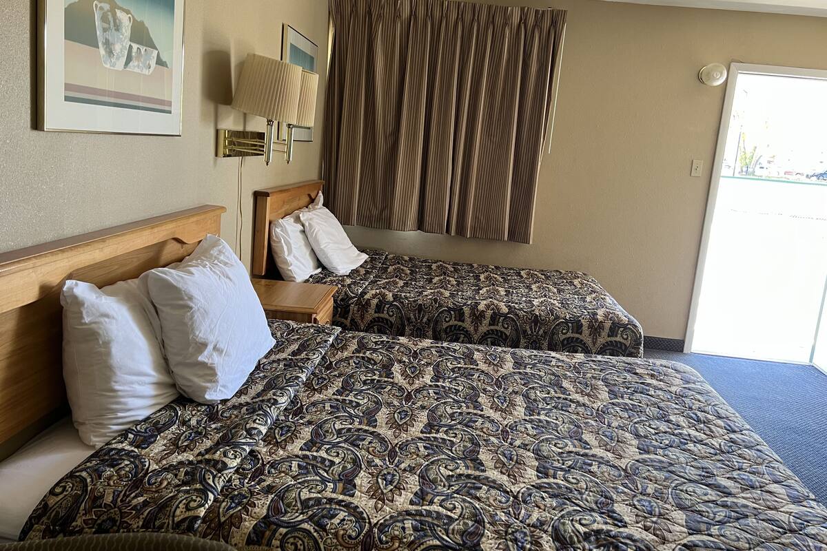 Room, 2 Queen Beds, Non Smoking | Iron/ironing board, free WiFi, bed sheets, alarm clocks