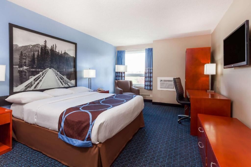 Premium bedding, desk, blackout drapes, iron/ironing board